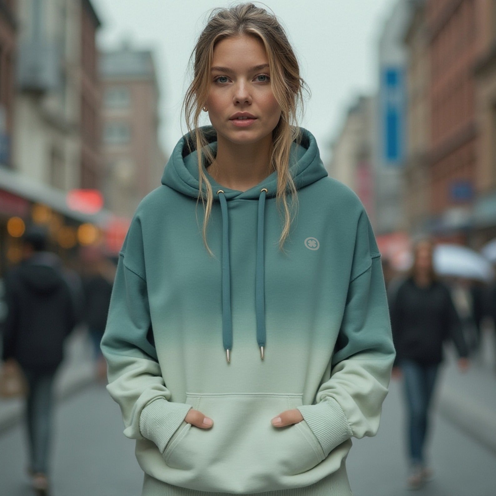 the be kind organic hoodie from the 138 way represented by a model in dubai