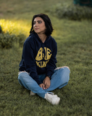 the be kind organic hoodie from the 138 way represented by a model in dubai